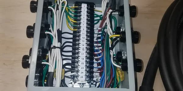 Custom terminal box assembly with internal wiring and color-coded leads